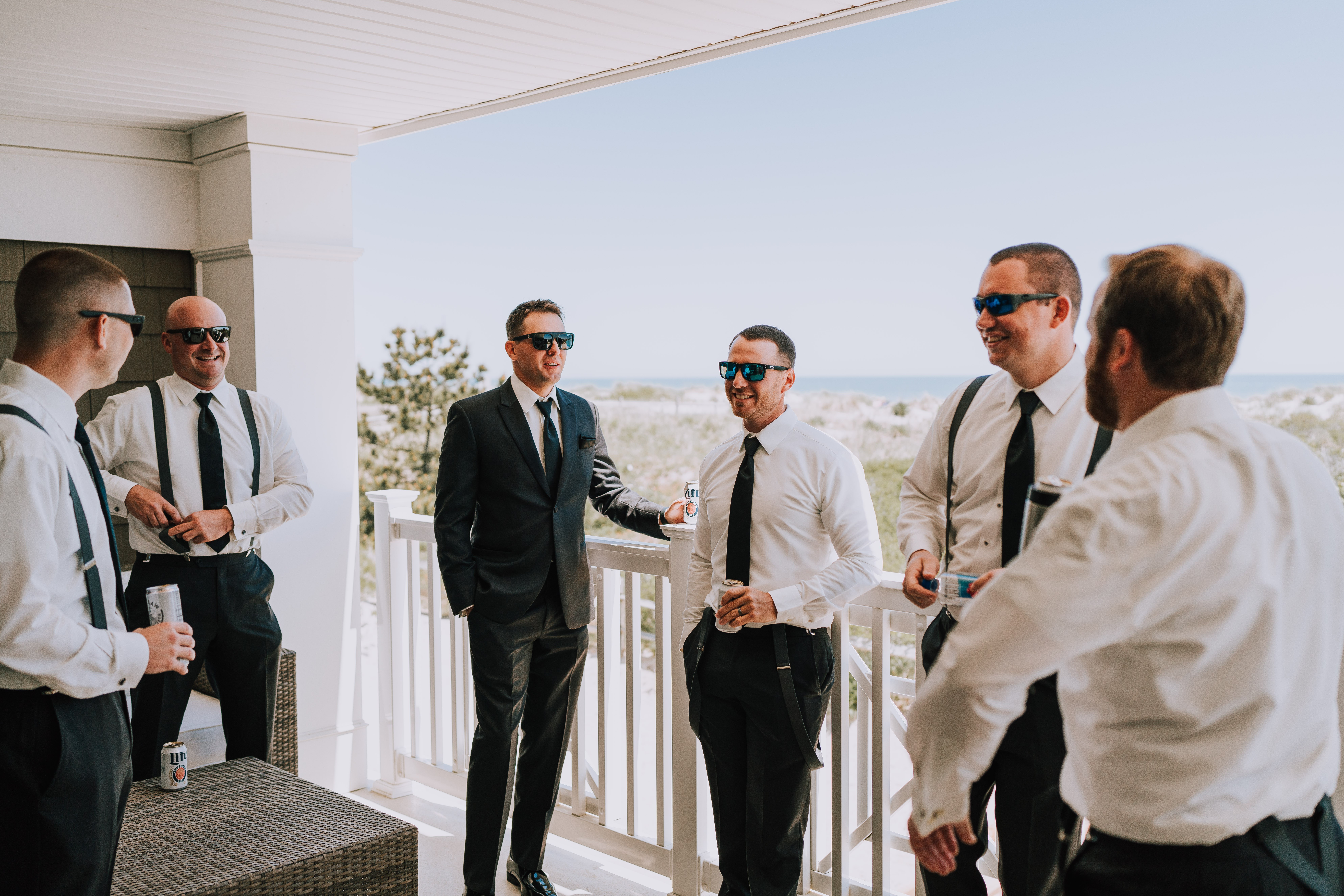 groomsmen at summer shore wedding