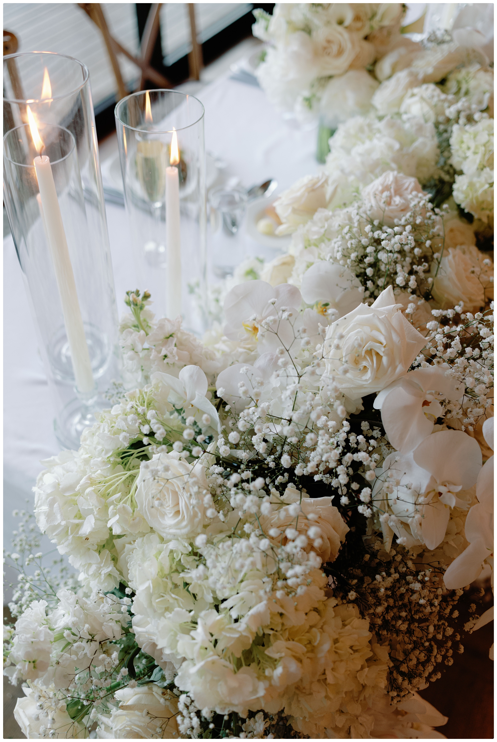 A Romantic Spring River House at Odette’s Wedding in New Hope, PA all white florals at wedding reception