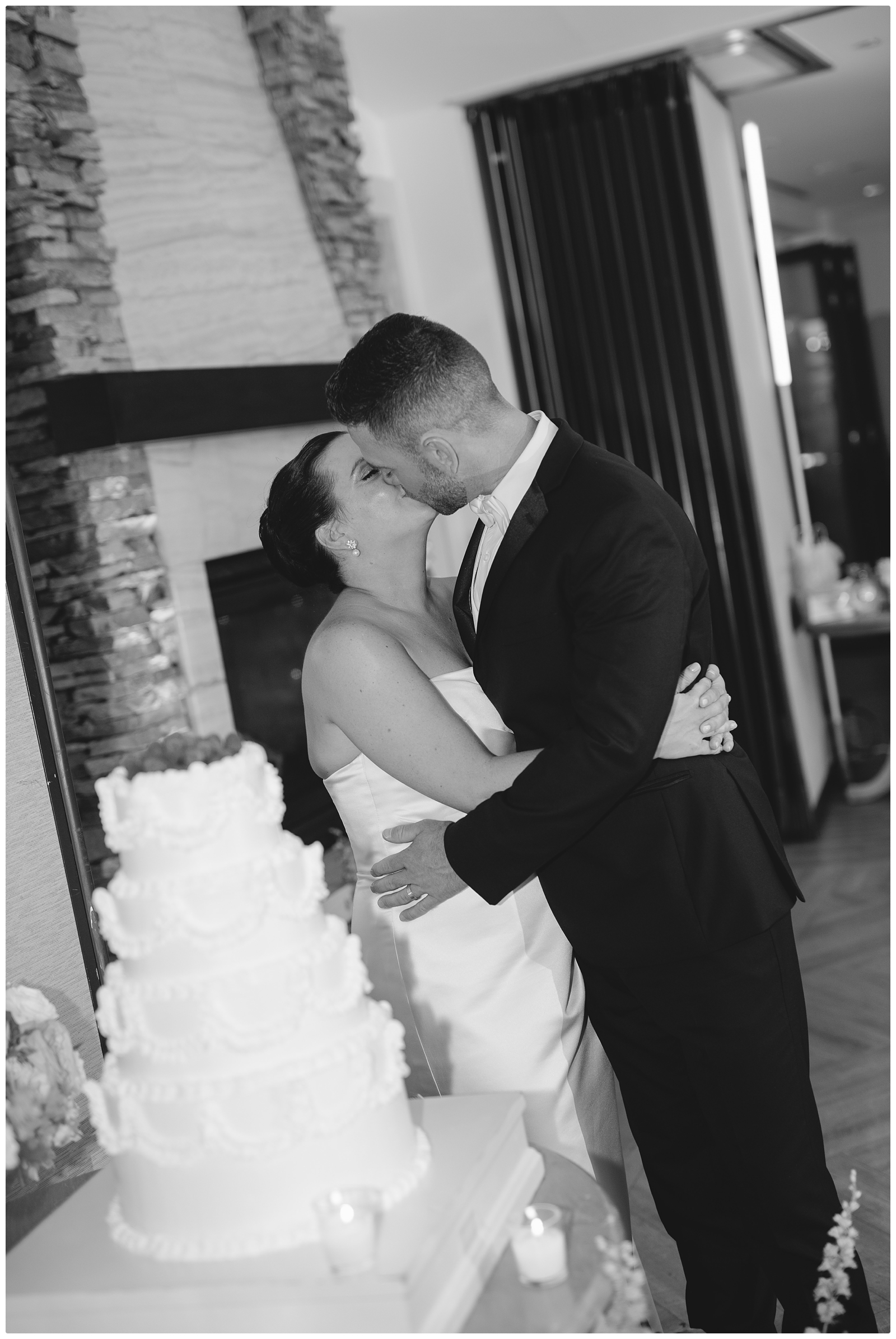 bride and groom cutting wedding cake at The reeds at shelter haven wedding